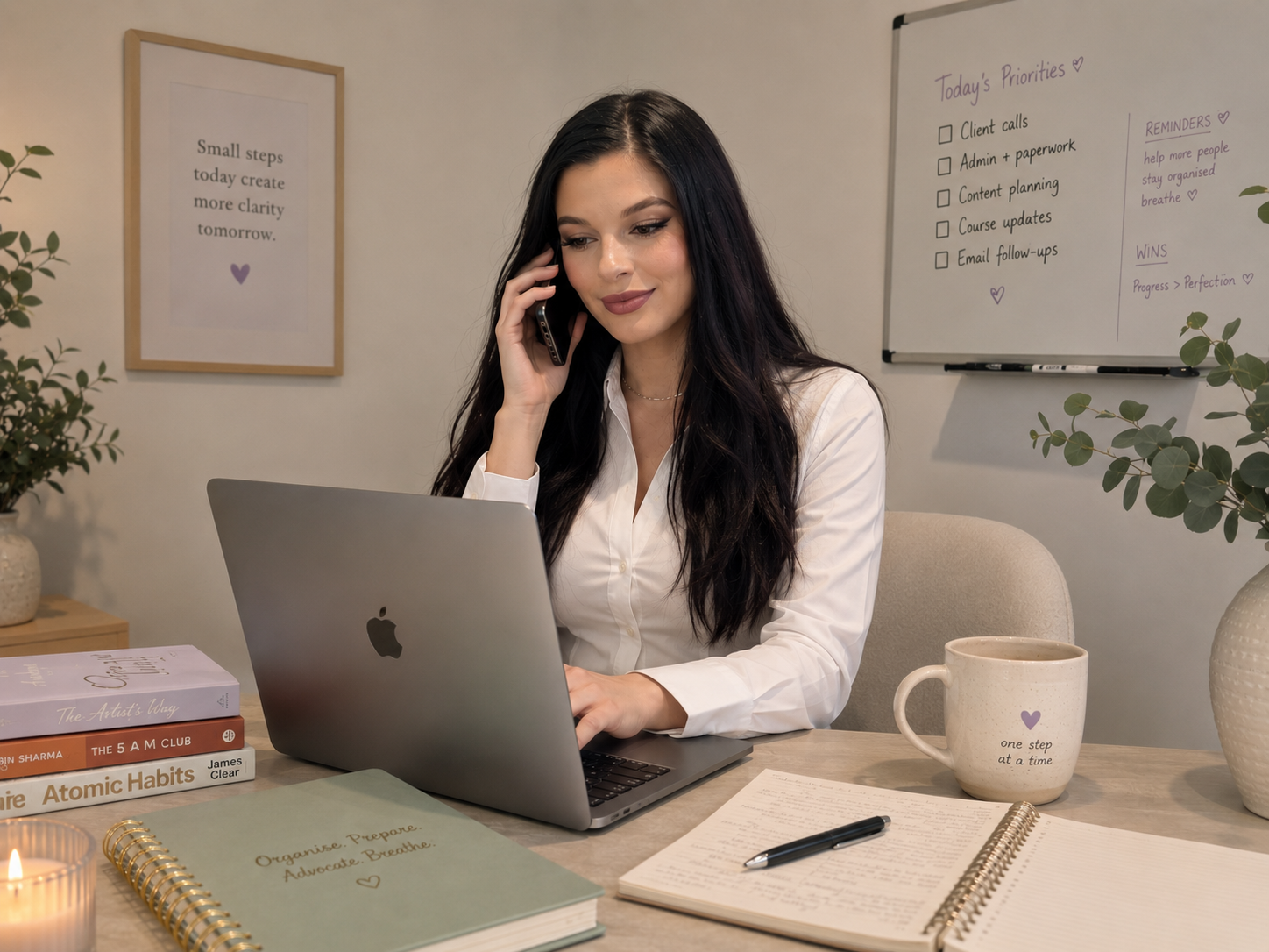 A calm, organised workspace with a laptop, planner and notes during a supportive session